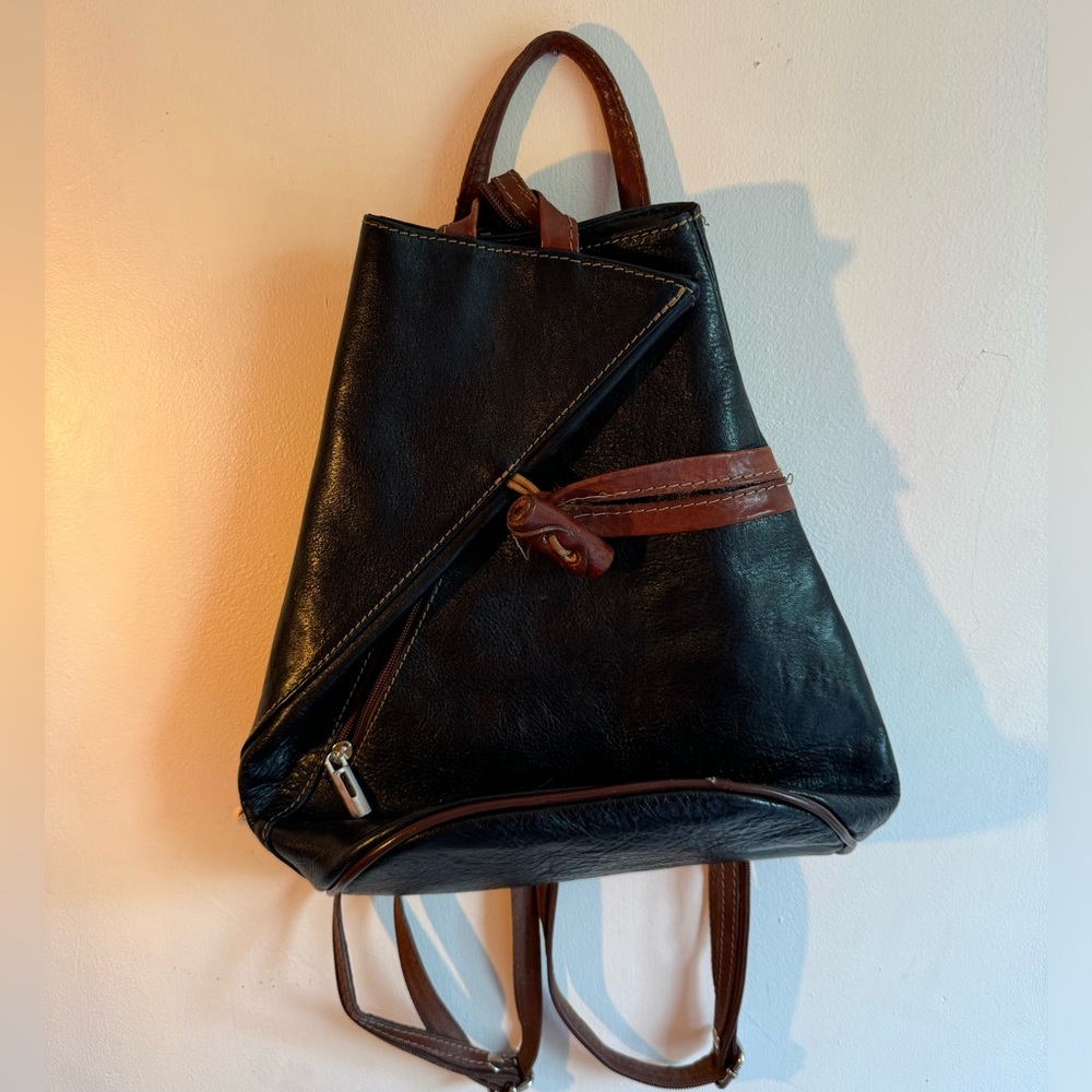 Vera Pelle black and brown leather back pack purse.